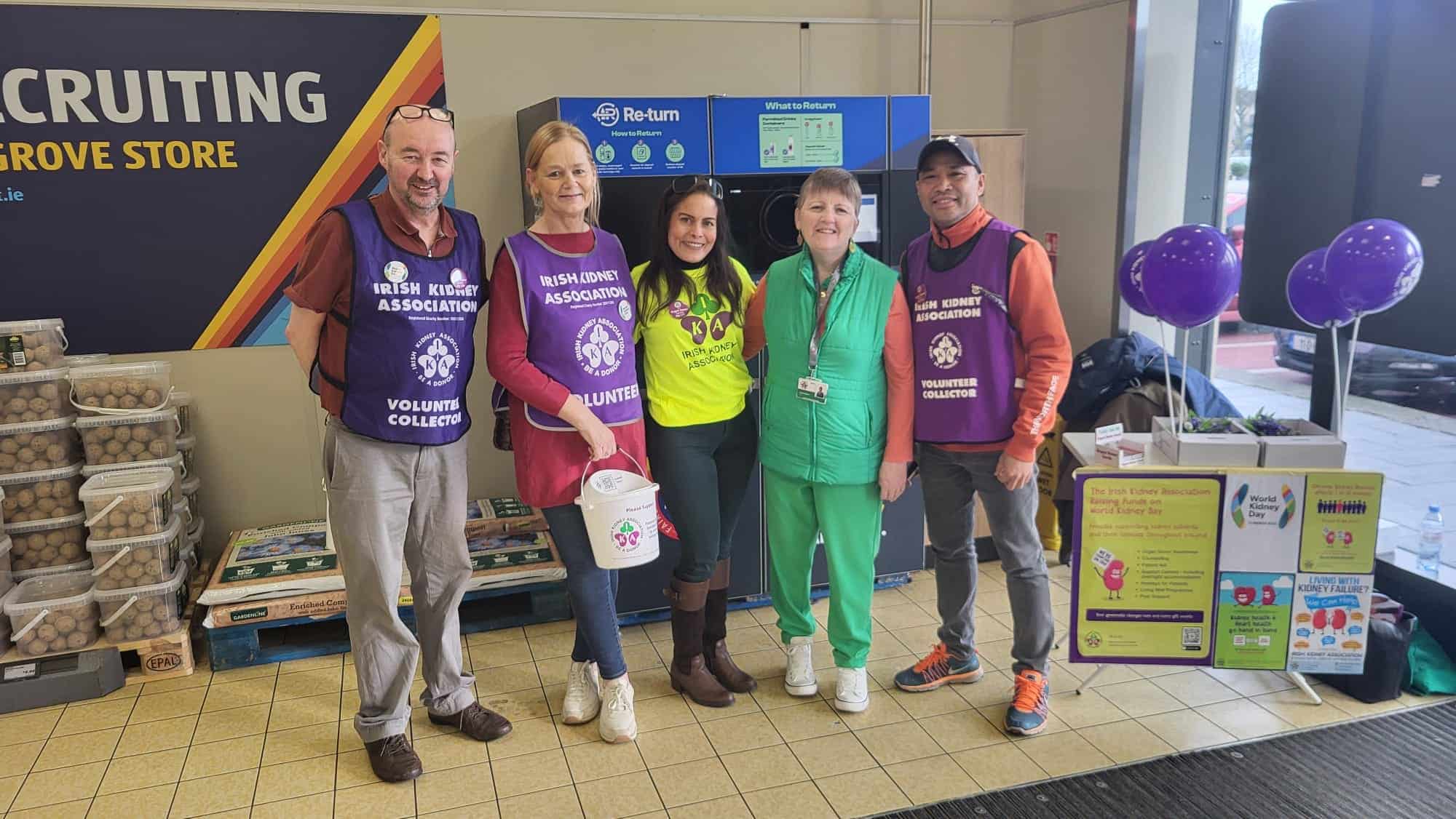 Supportive team members at Irish Kidney Association volunteer event in Ireland.