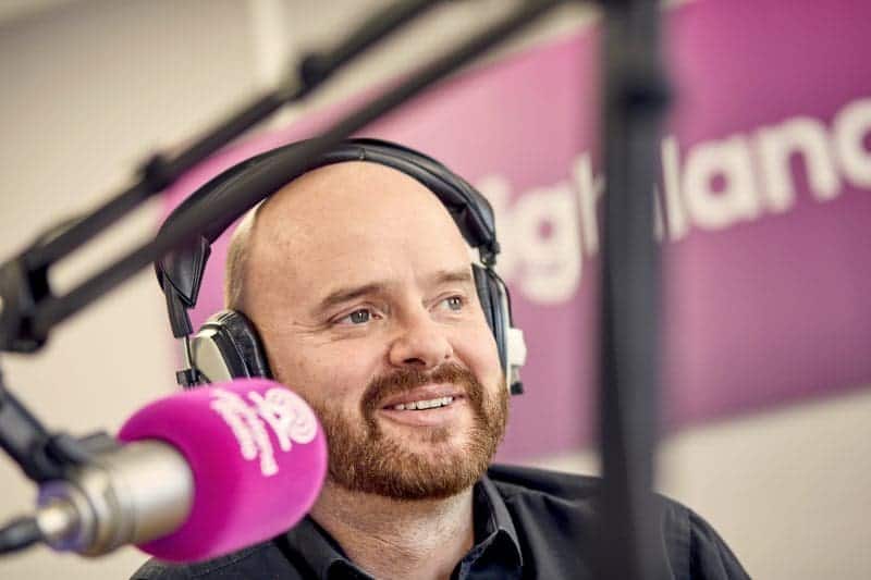 Irish Kidney Association radio interview with a man wearing headphones.